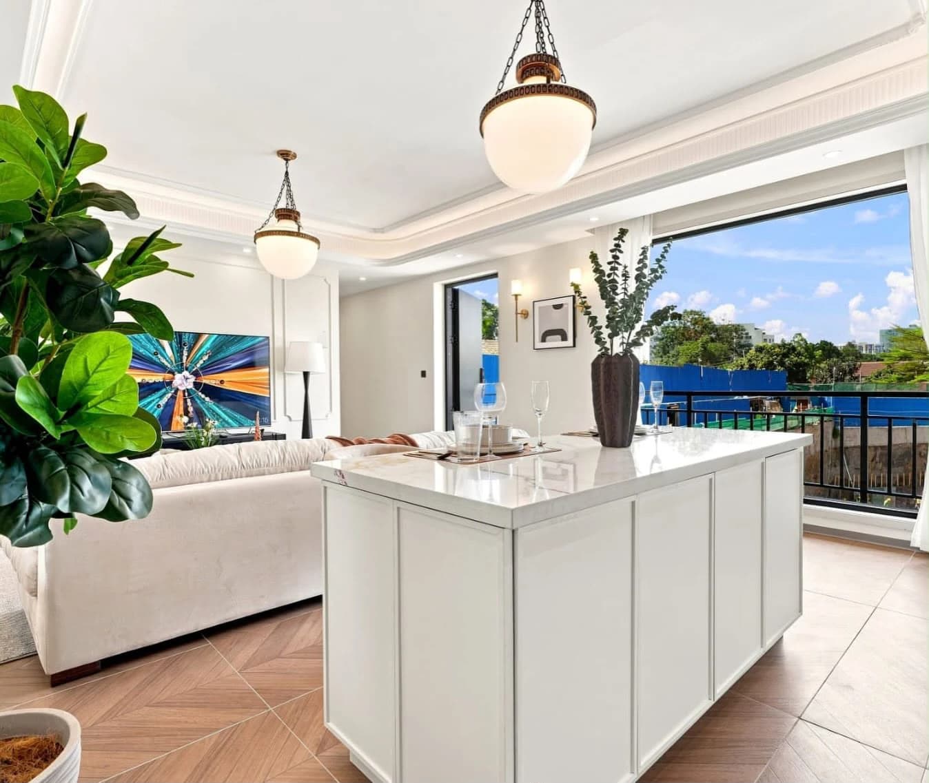 Living room and kitchen inside a furnished Brookside Oak apartment