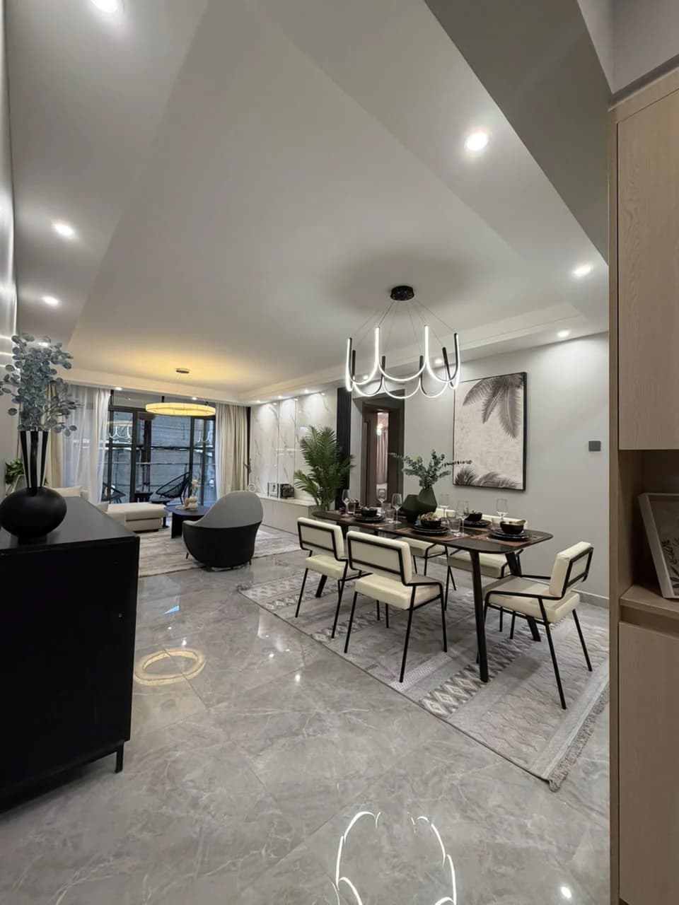 Living and dining area inside a furnished Casa Rina Heights apartment