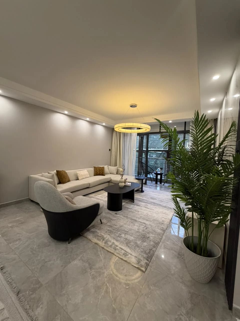 Living room in a furnished Casa Rina Heights apartment