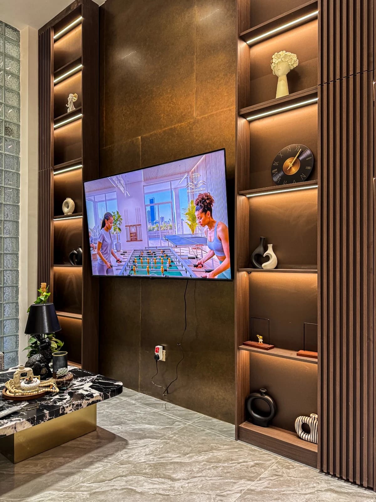 Diamond Bay Residence lounge with media wall