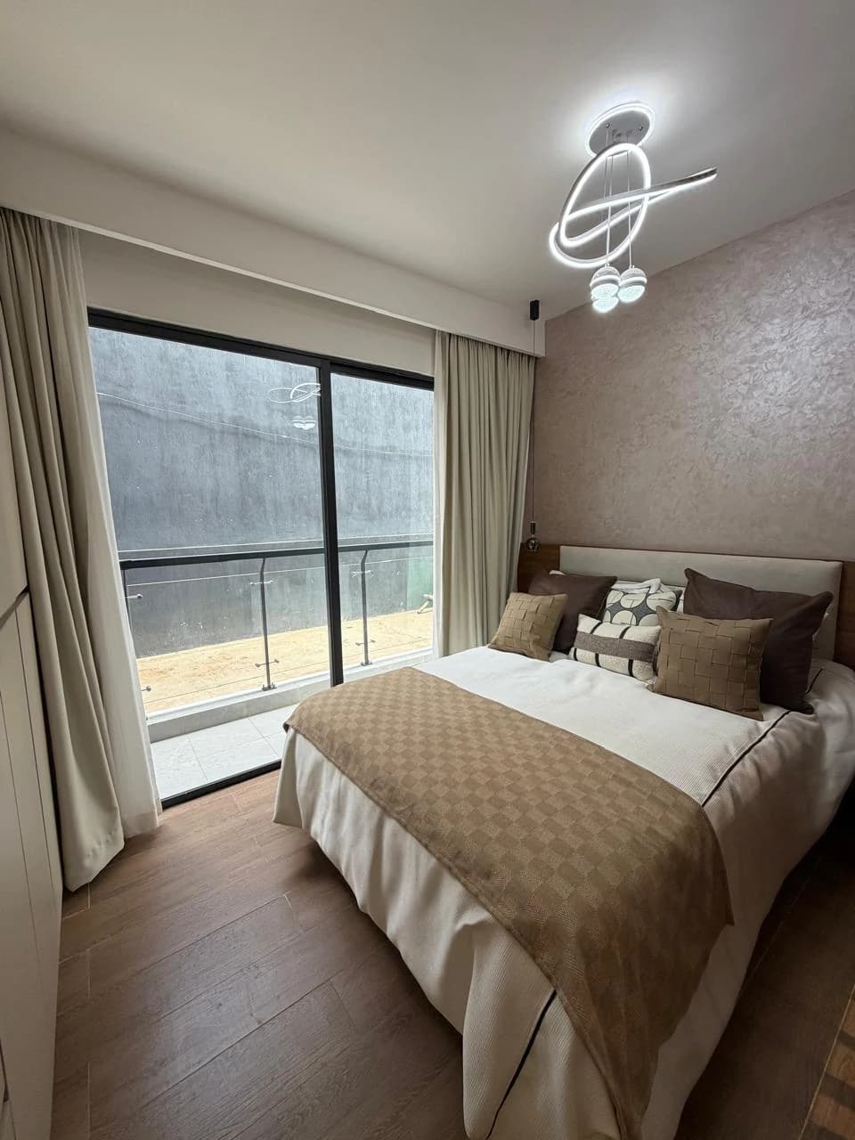 Bedroom area inside the Mogotio Oasis studio show apartment